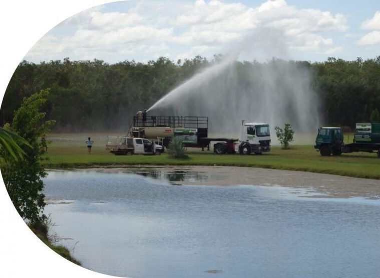 Workers Hydromulching the Grass — Spray Grass in Northern Territory