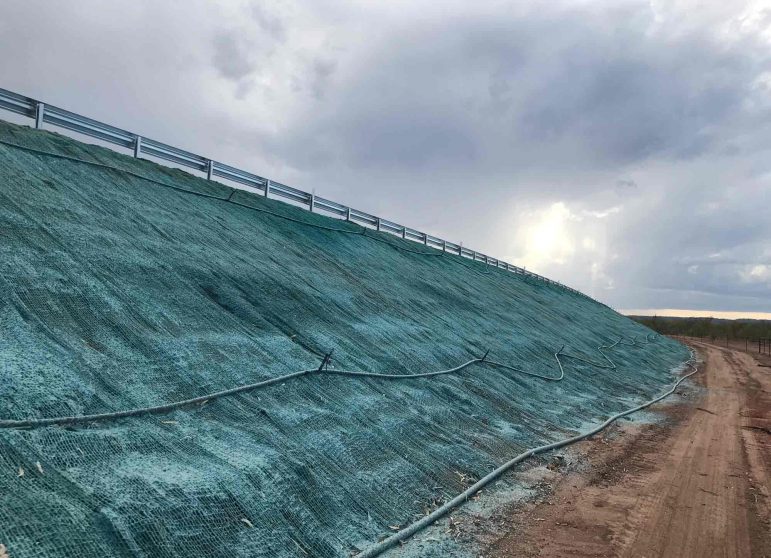 The Soil Beside the Bridge has Sprayed Flexterra — Spray Grass in Northern Territory